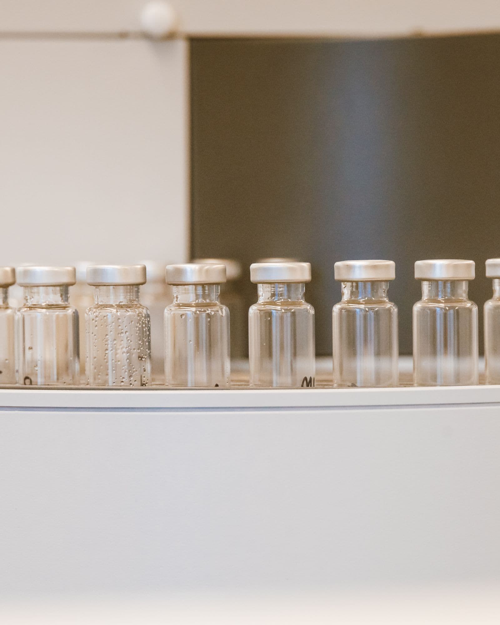 Sample vials lined up in a laboratory