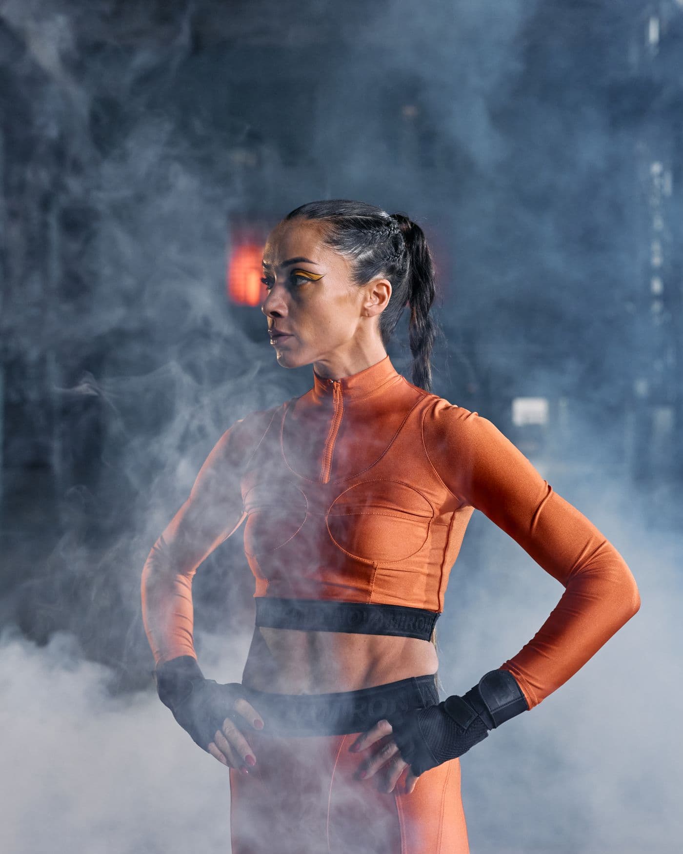 Athlete in an orange training top